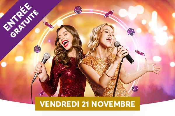 Deux chanteuses éclatantes, vêtues de robes pailletées et joyeuses, se produisent sur scène avec des micros à la main, entourées d’un décor lumineux et festif. Un bandeau violet “ENTRÉE GRATUITE” et un ruban doré affichent l’événement, suggérant une ambiance glamour et festive. Au bas de l’image, une bannière jaune annonce l’événement du “VENDREDI 21 NOVEMBRE”, indiquant la date à ne pas manquer.