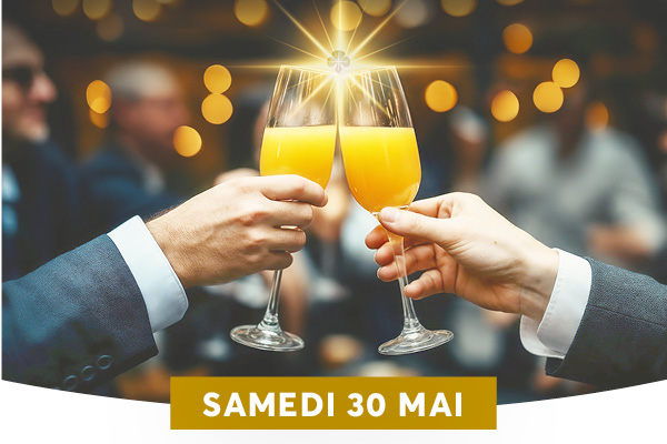 Deux personnes en costume trinquent avec des fl�tes remplies de jus d'orange, sous un effet lumineux en forme d'�toile au point de contact des verres, dans une ambiance festive et �l�gante. Le texte 